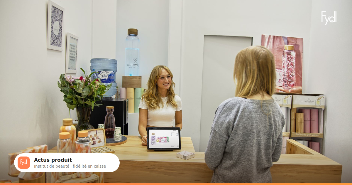 Intégration caisse fidélité Fydl : réceptionniste d'institut de beauté encaissant une cliente